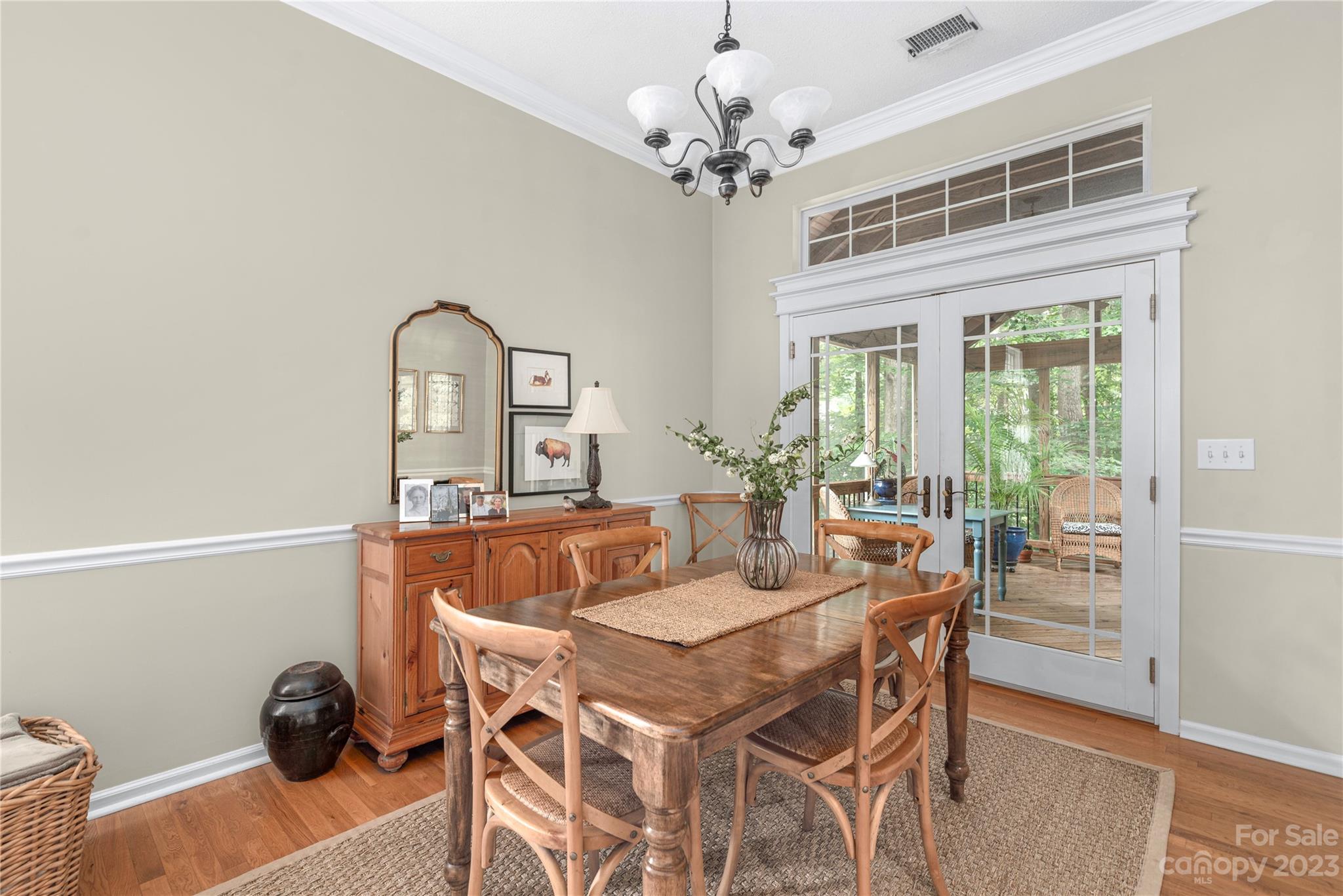 13328 Sloe Way Huntersville, NC 28078 - Photo 12 of 32 a view of a dining room with furniture and wooden floor