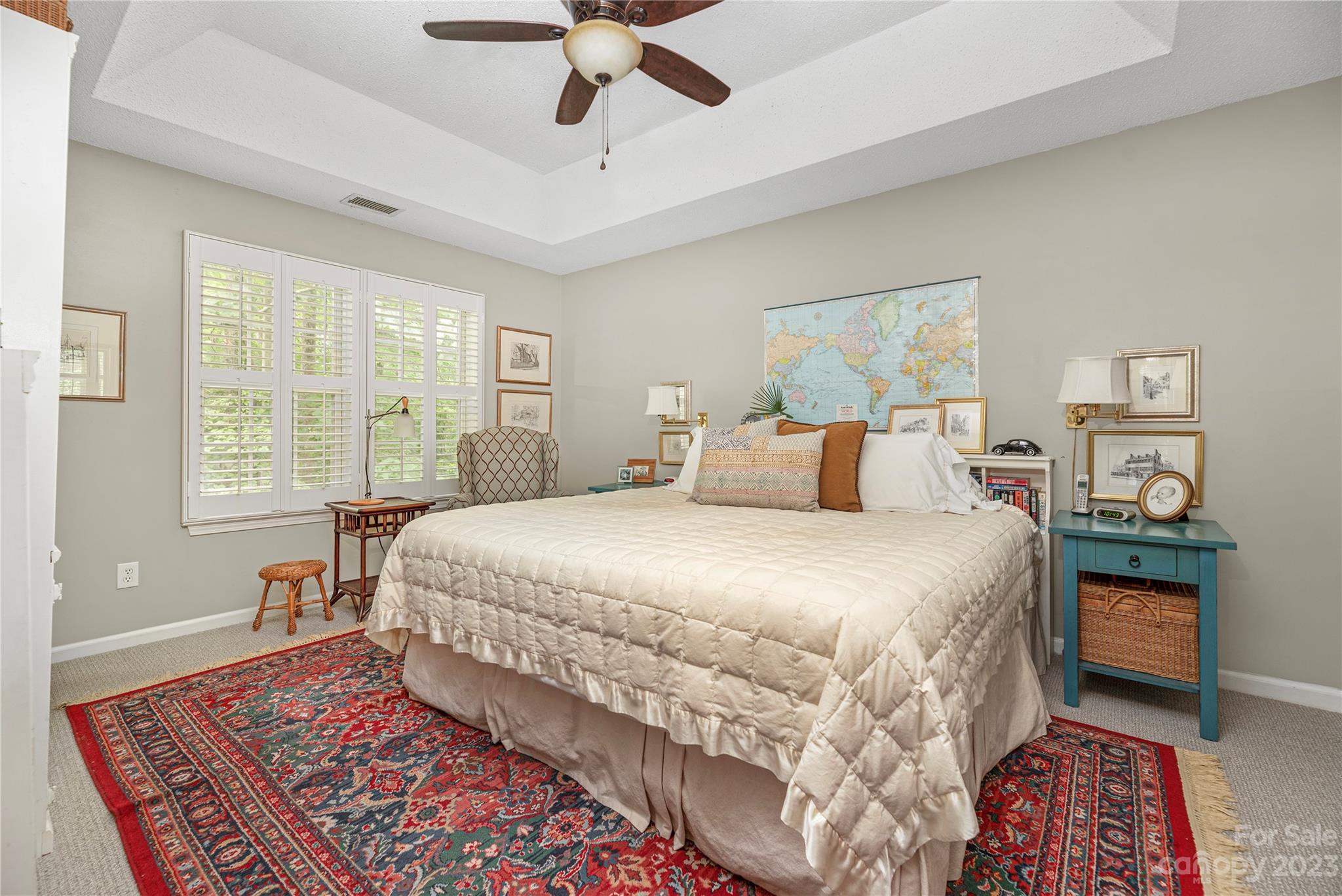 13328 Sloe Way Huntersville, NC 28078 - Photo 13 of 32 a bedroom with a bed and a chandelier