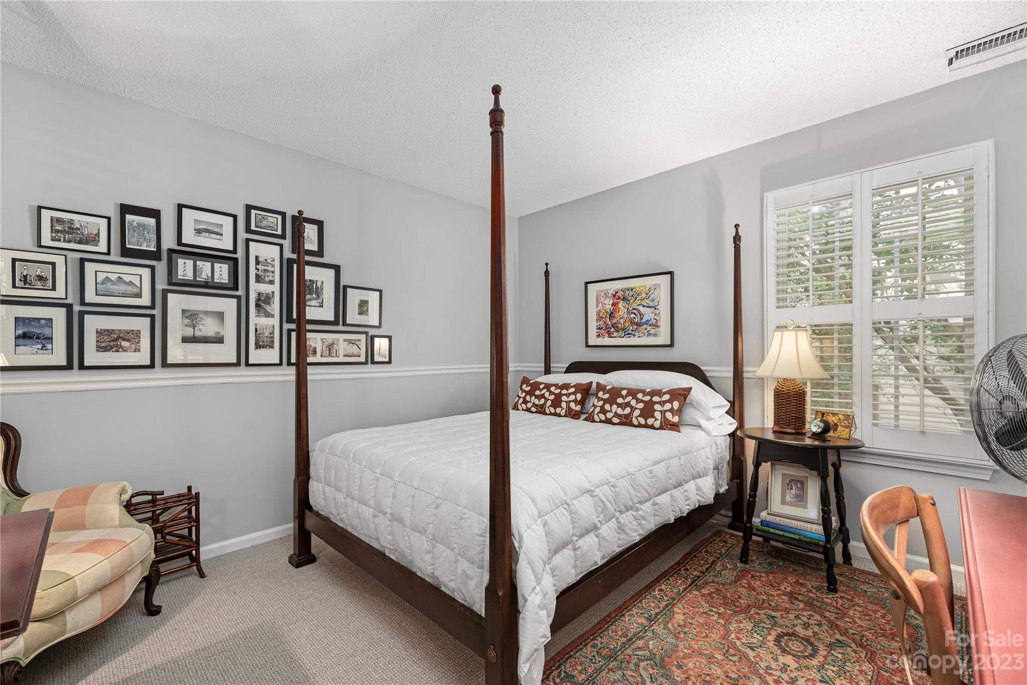 13328 Sloe Way Huntersville, NC 28078 - Photo 15 of 32 a bedroom with a bed couch and a window