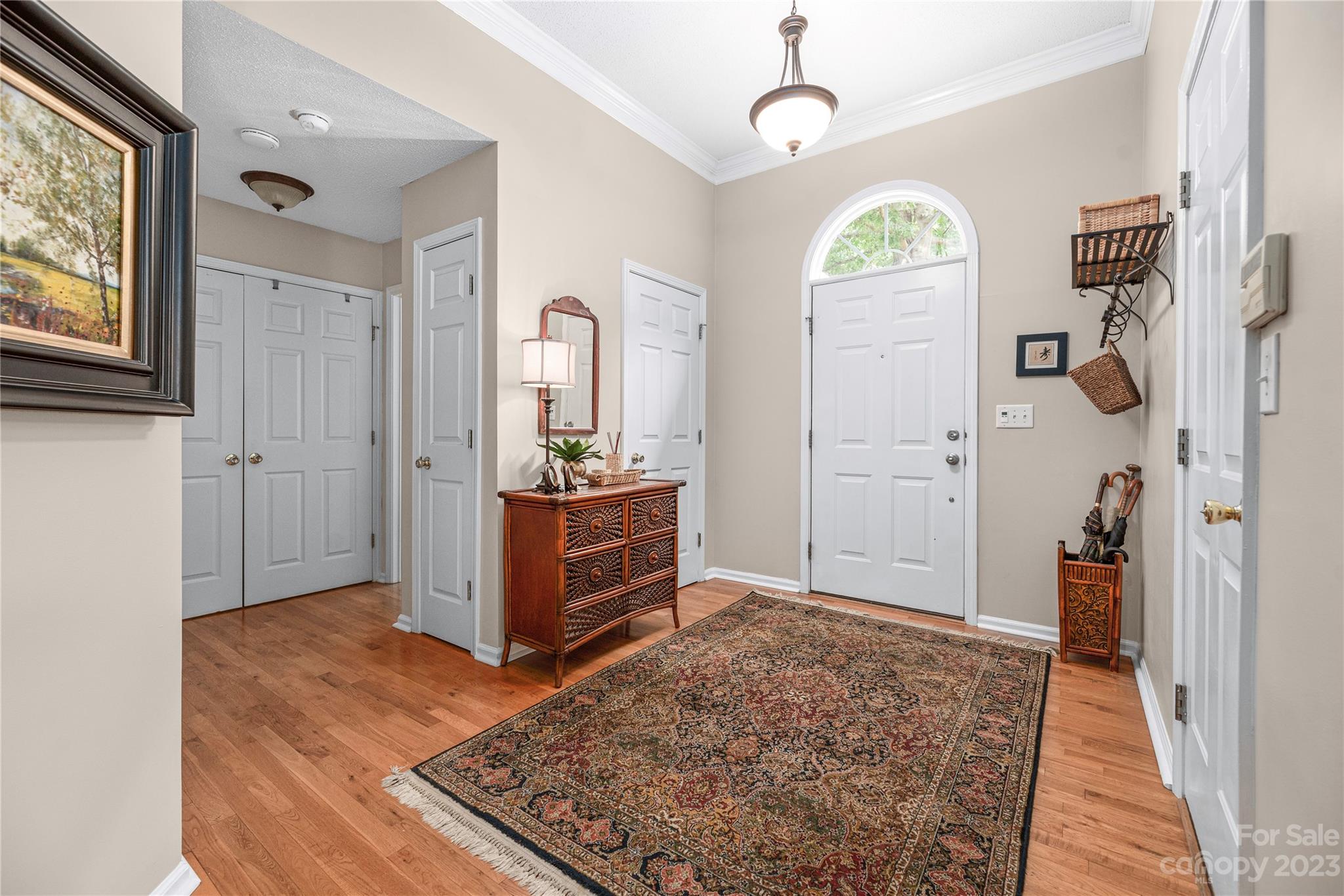 13328 Sloe Way Huntersville, NC 28078 - Photo 2 of 32 a view of room with window and hardwood floor
