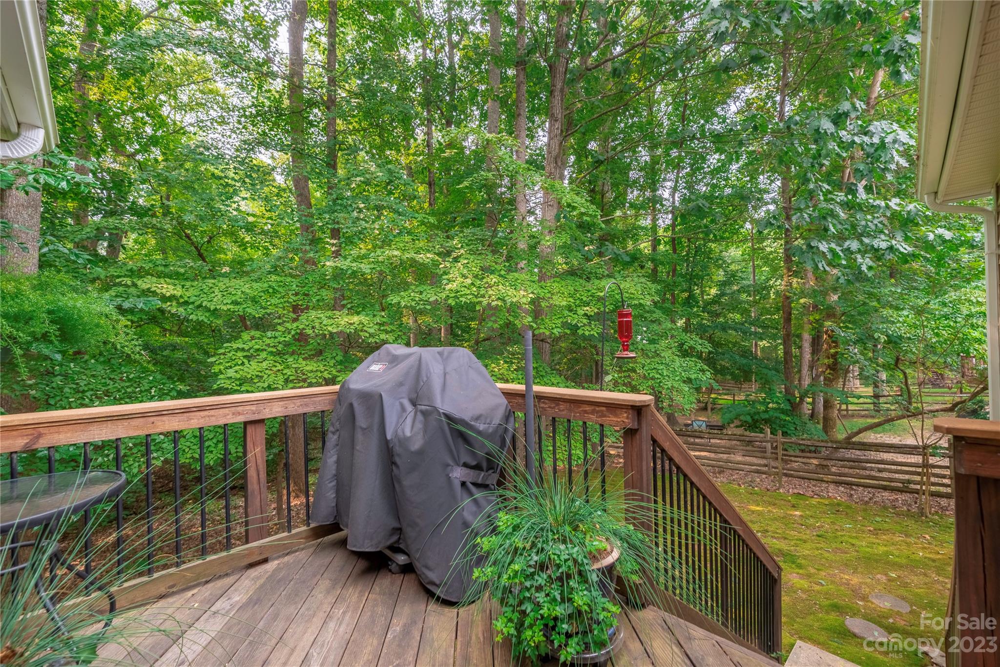 13328 Sloe Way Huntersville, NC 28078 - Photo 29 of 32 a view of a balcony with wooden floor and fence