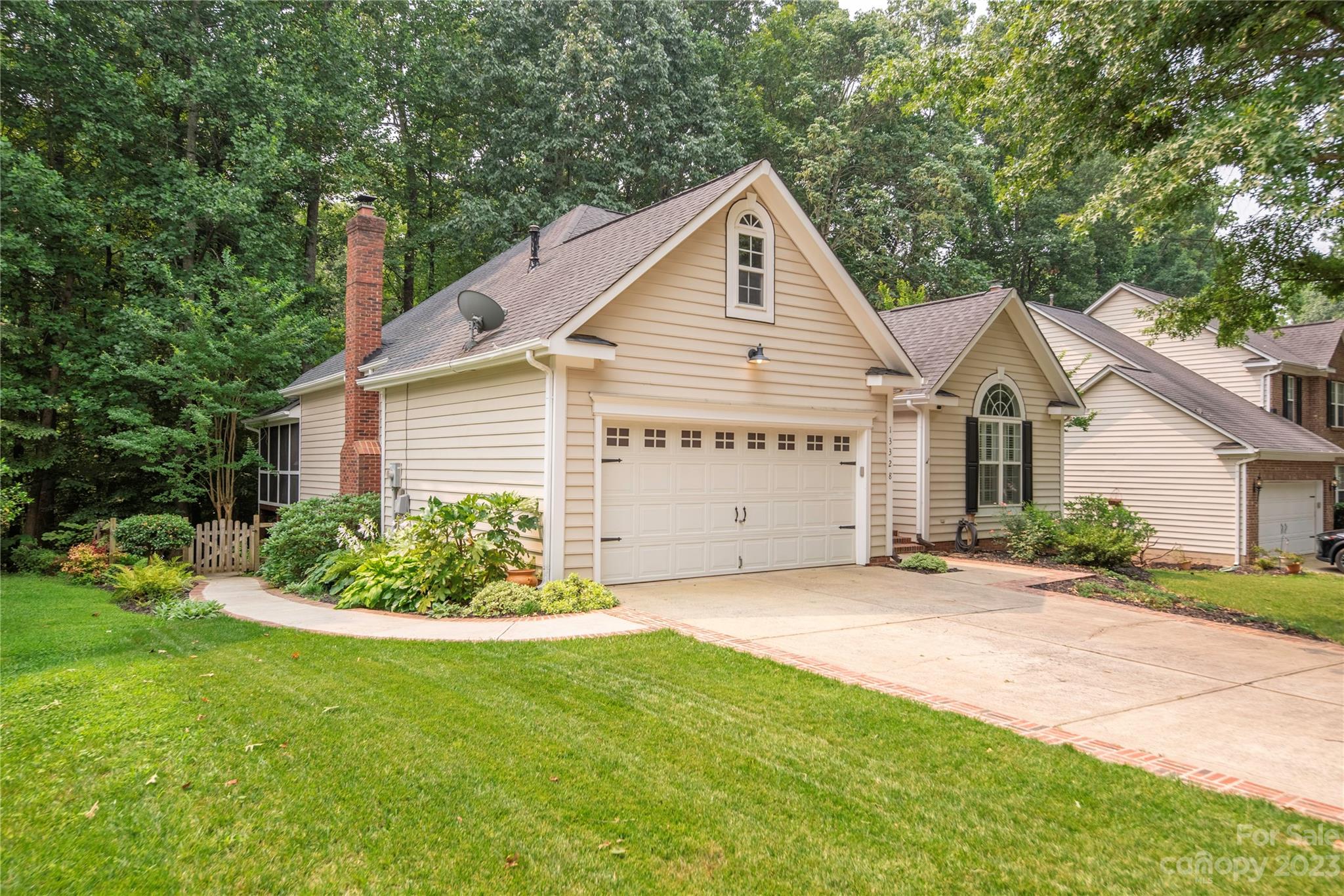 13328 Sloe Way Huntersville, NC 28078 - Photo 32 of 32 a view of a house with a yard and potted plants