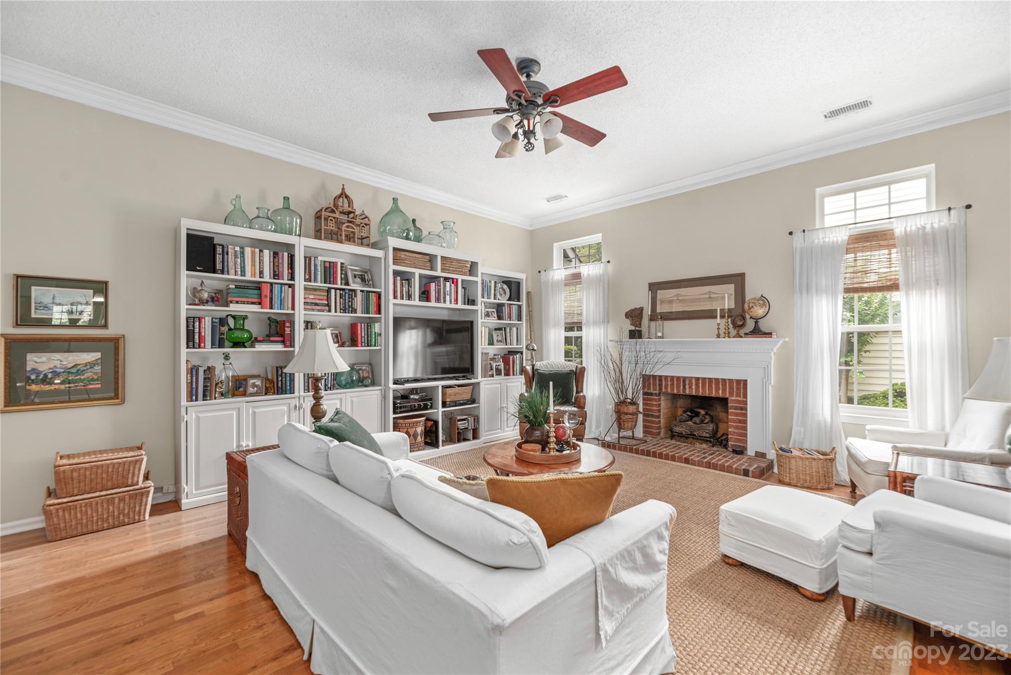 13328 Sloe Way Huntersville, NC 28078 - Photo 5 of 32 a living room with furniture fireplace and a window