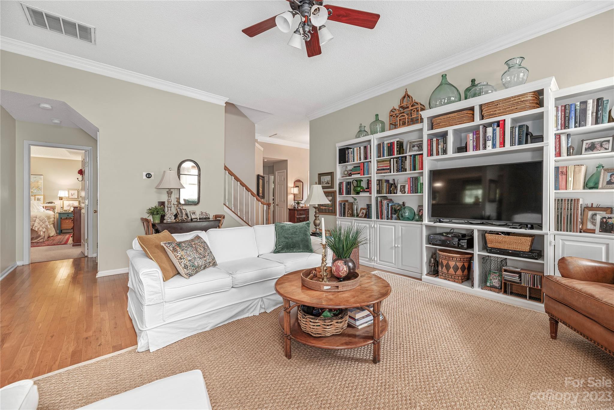 13328 Sloe Way Huntersville, NC 28078 - Photo 6 of 32 a living room with furniture and a flat screen tv