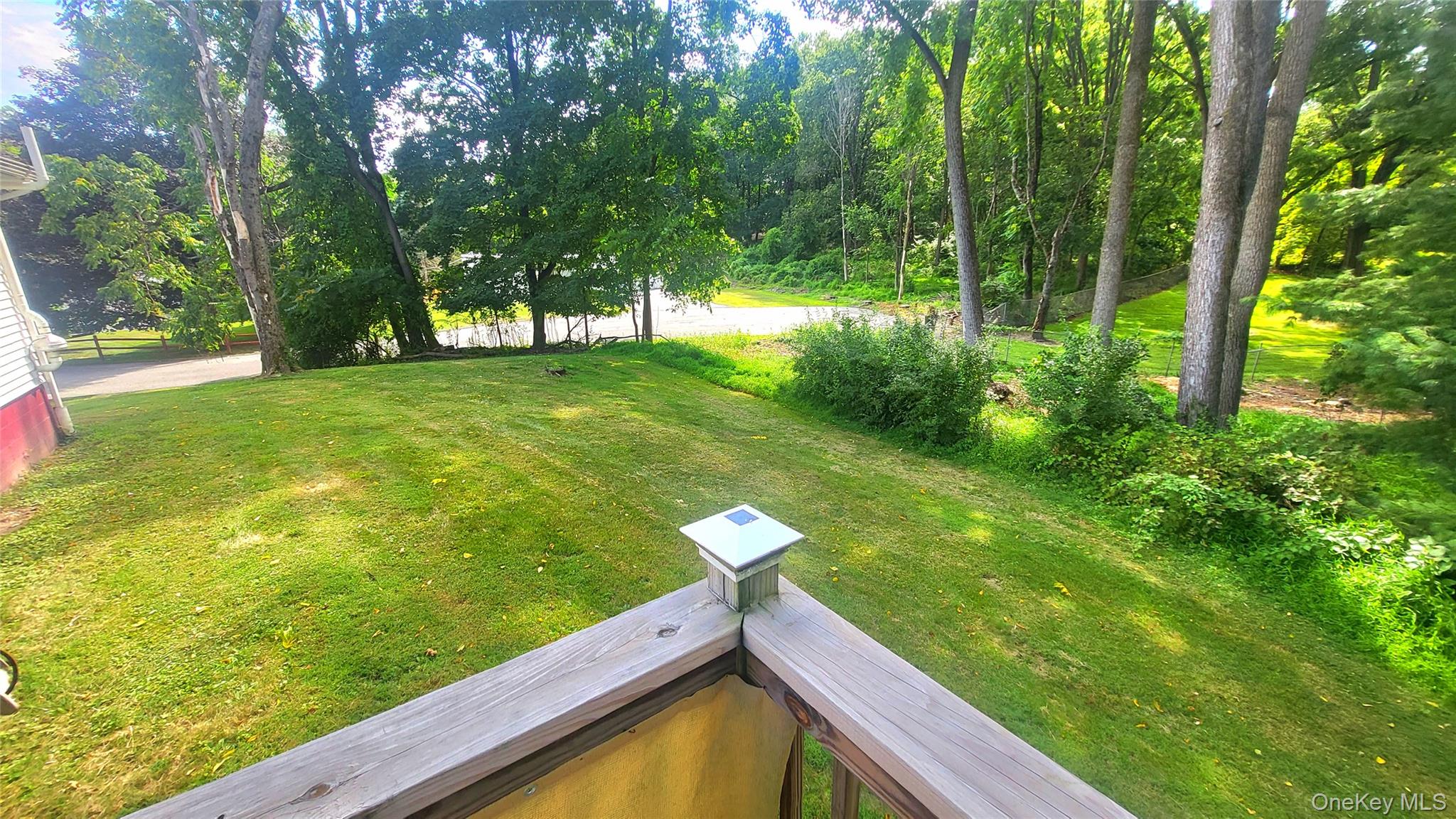 12 High Ridge Road Poughkeepsie, NY 12603 - Photo 31 of 34 Deck view of grassy yard