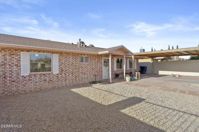 a view of a house with a street