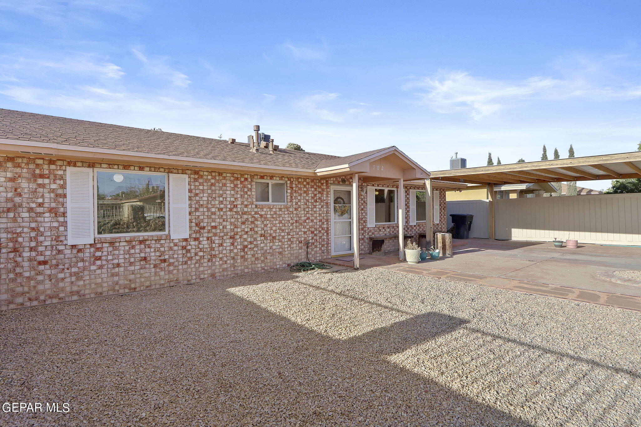 a view of a house with a street