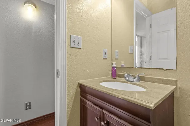 a workspace with furniture and a window