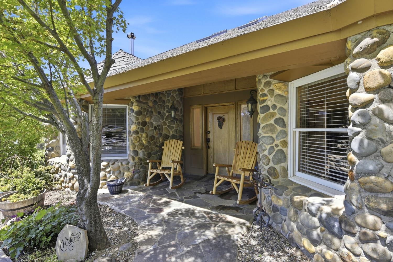 7201 Happy Valley Road Somerset, CA 95684 - Photo 8 of 75 The nicely shaded front porch is an inviting entry into the home