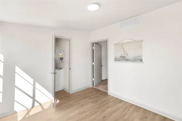 a view of a room that has a window in it