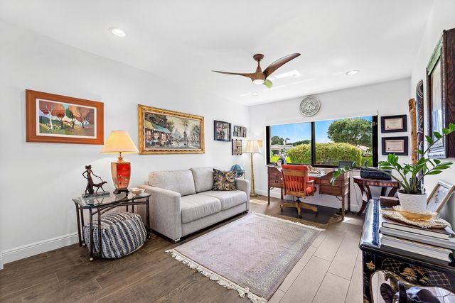a bathroom with a shower sink vanity granite and mirror