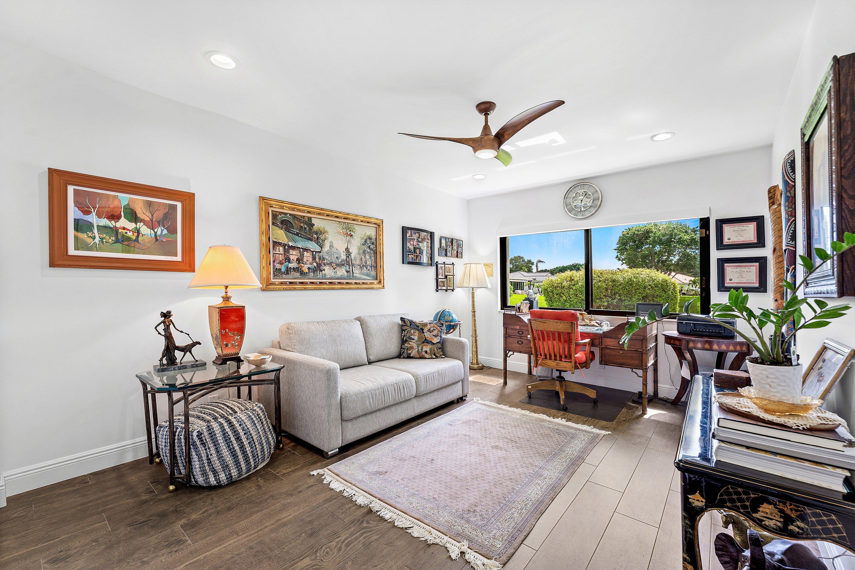 35 Woods Lane Boynton Beach, FL 33436 - Photo 20 of 82 a living room with furniture and a large window