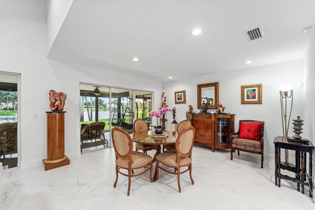 a bathroom with a sink a large mirror and shower