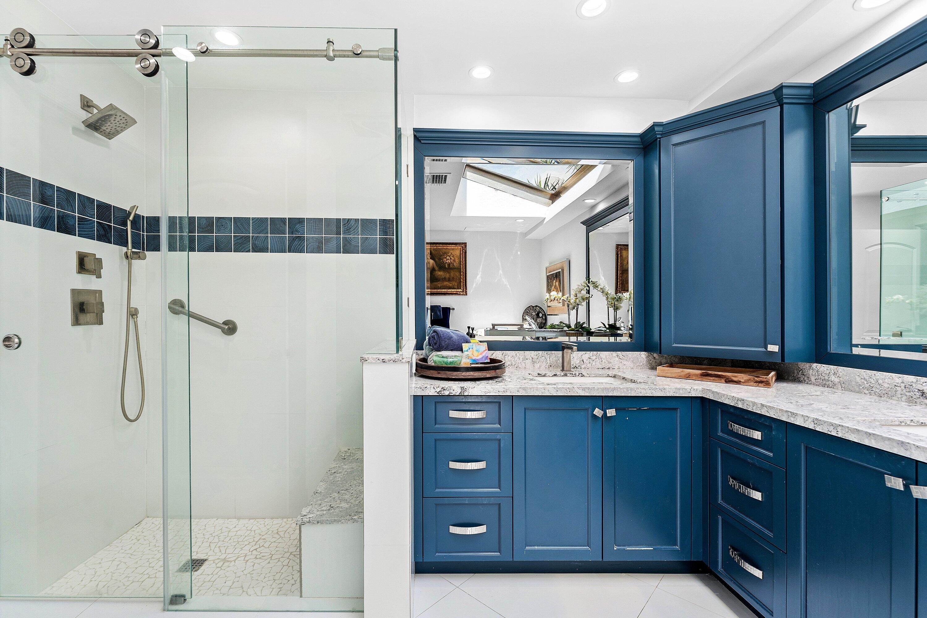 35 Woods Lane Boynton Beach, FL 33436 - Photo 28 of 82 a bathroom with a shower sink vanity granite and mirror