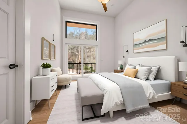 a bedroom with a bed and a large mirror