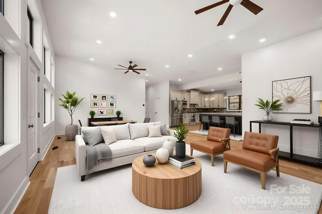 a living room with furniture and a rug