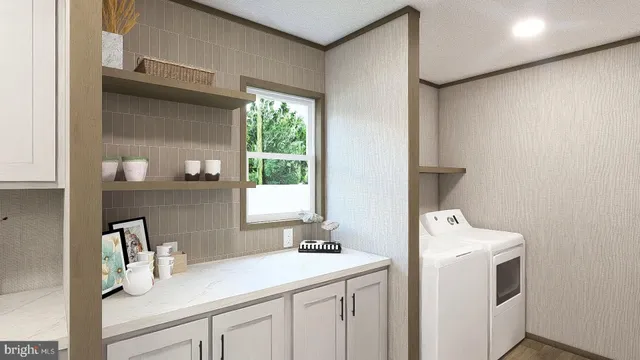 a view of bathroom with a sink and a vanity