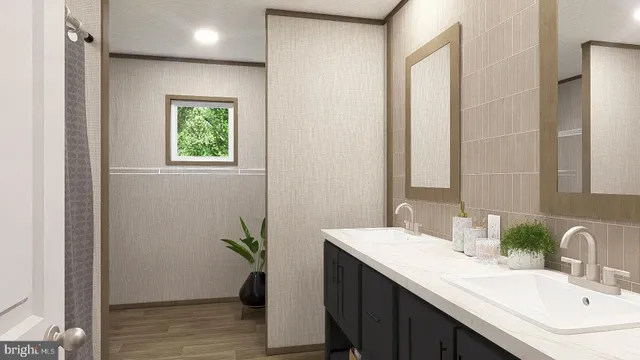 a bathroom with a double vanity sink and a mirror