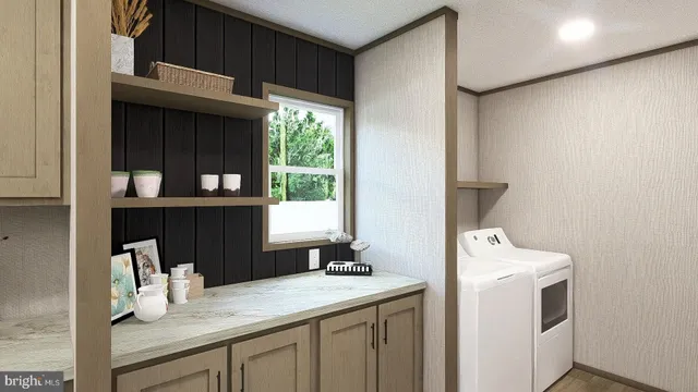 a view of kitchen island with sink