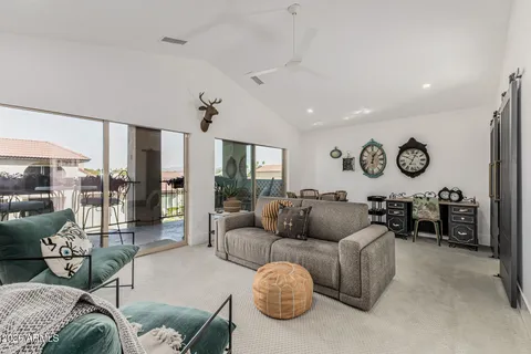 a spacious bathroom with double vanity sinks a large mirror and a shower