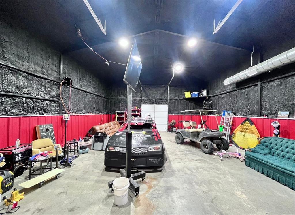 240 County Road Paris, TX 75462 - Photo 25 of 25 a view of parking garage with cars