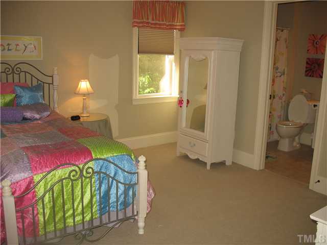 1413 Rhea Drive Garner, NC 27529 - Photo 11 of 12 This huge bedroom can be used as a second master! It has a bathroom and large walk in closet!