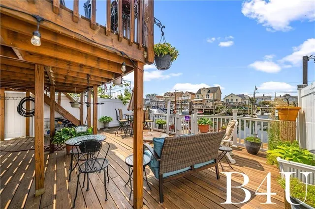 a view of a balcony with chairs