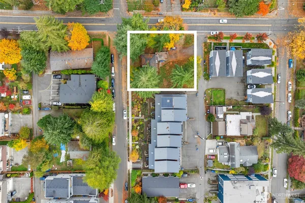 an aerial view of houses with outdoor space