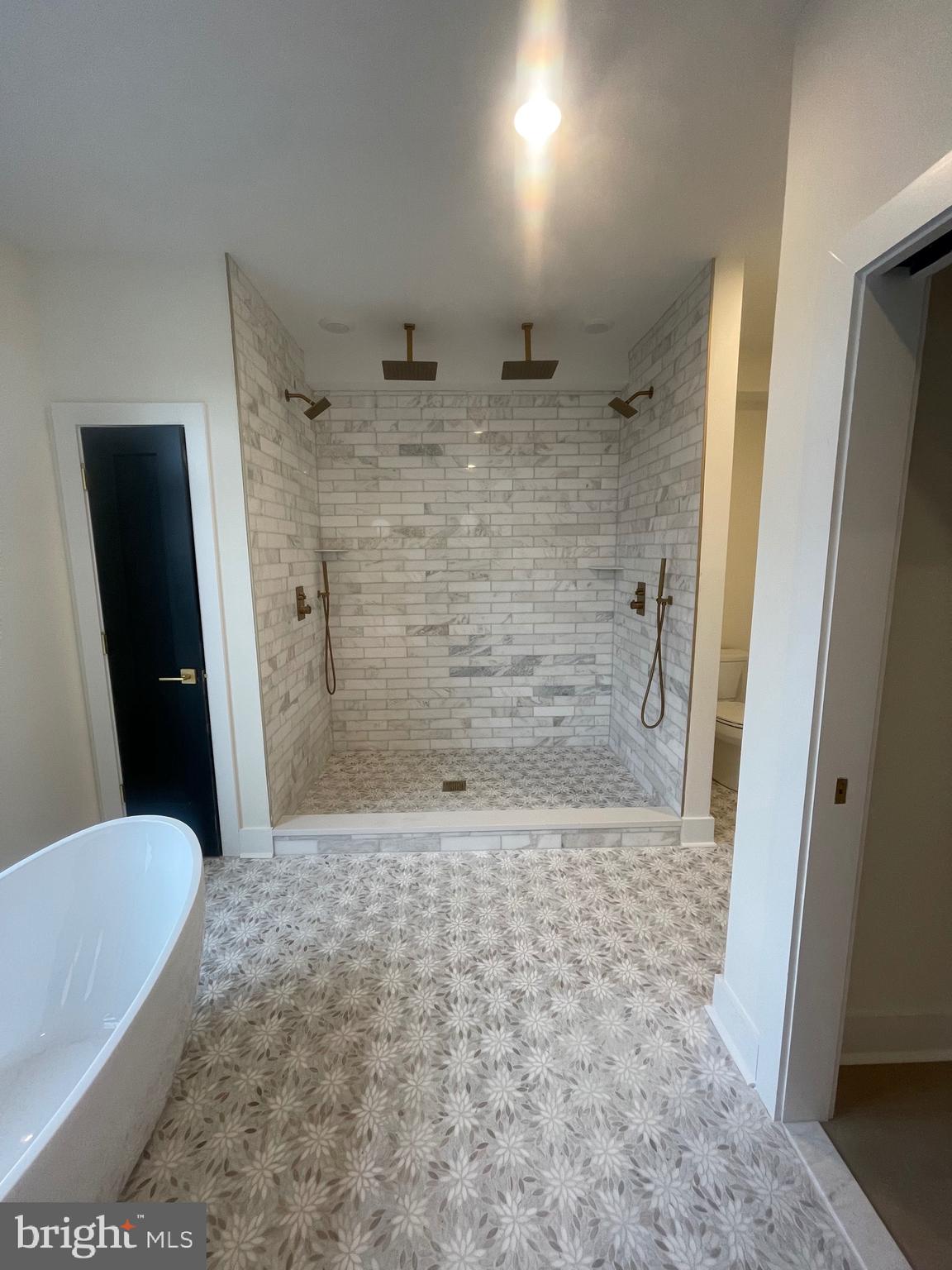 7519 Ridge Avenue Philadelphia, PA 19128 - Photo 13 of 26 a bathroom with a shower