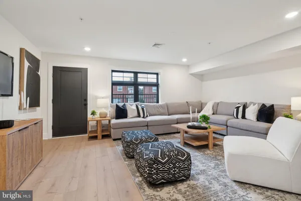 a living room with furniture and a couch