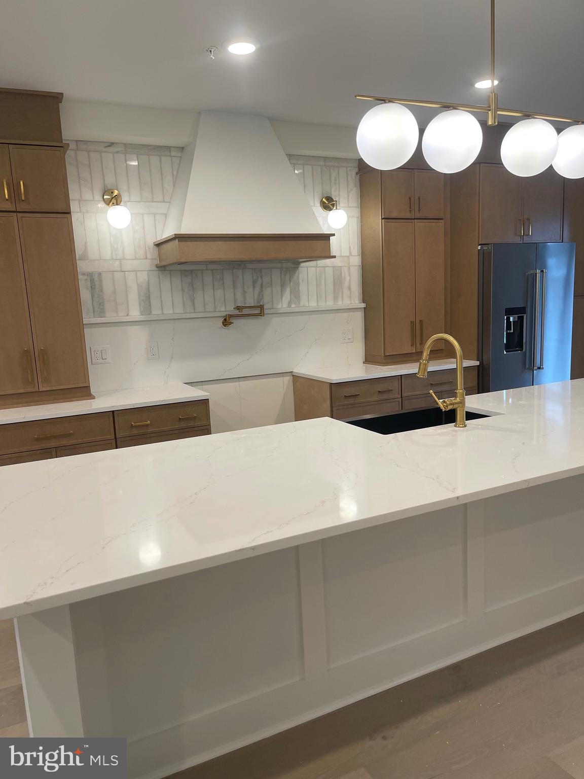 7519 Ridge Avenue Philadelphia, PA 19128 - Photo 3 of 26 a bathroom with a sink and a mirror