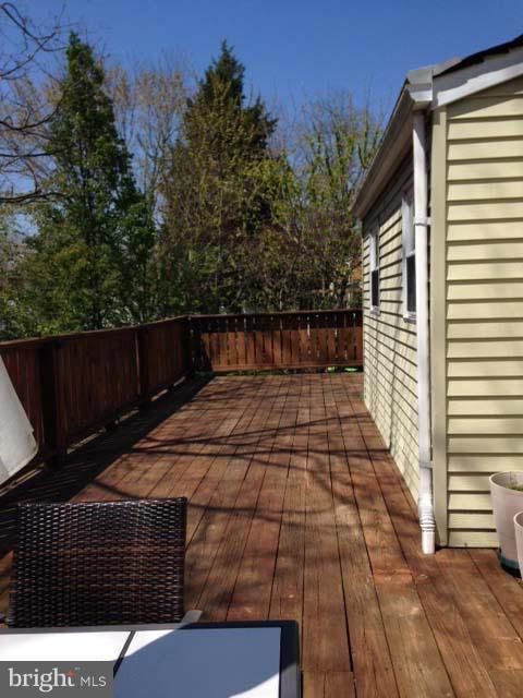 508 Tulip Road Riva, MD 21140 - Photo 20 of 27 Large Rear Deck Runs the Length of Home
