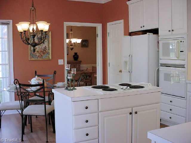 6300 High View Road Greensboro, NC 27410 - Photo 8 of 9 Other. Another updated chandelier, pantry and tons of great cabinet space make this room complete.