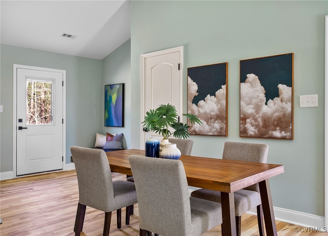 8011 Courthouse Road Providence Forge, VA 23140 - Photo 14 of 29 Dining area featuring baseboards, lofted ceiling,