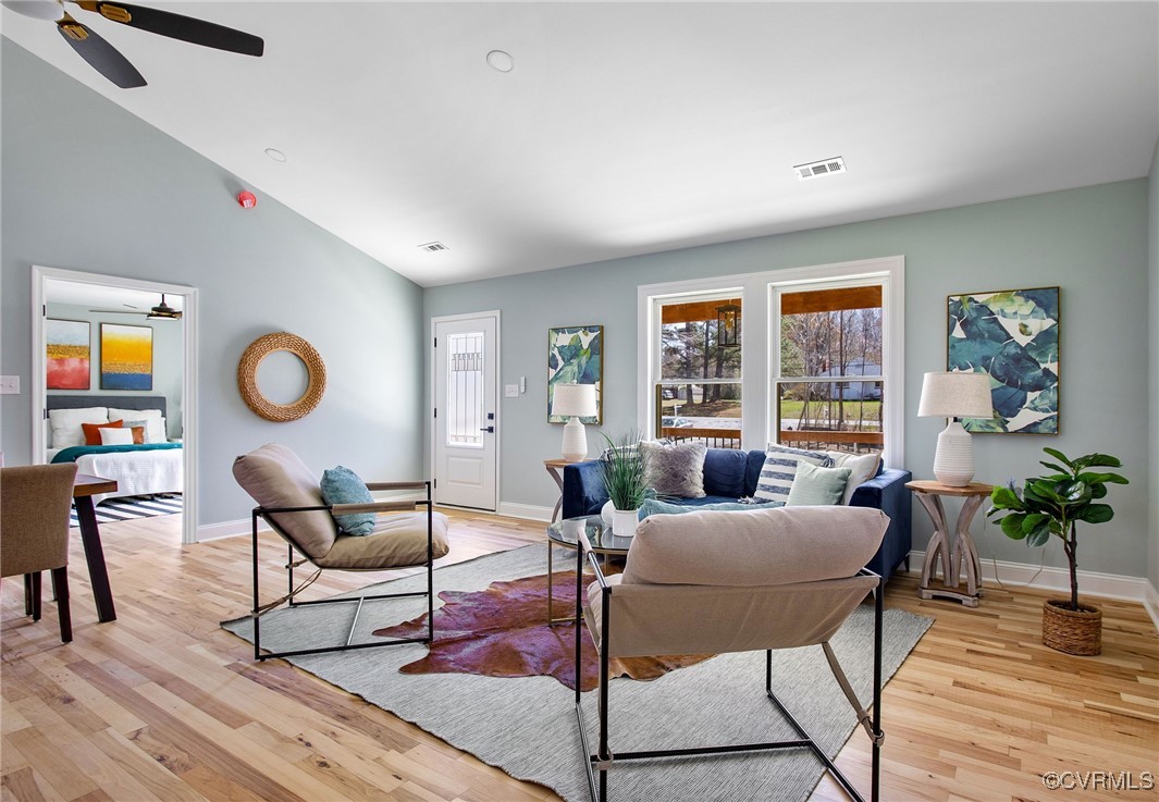 8011 Courthouse Road Providence Forge, VA 23140 - Photo 29 of 29 Living room featuring a ceiling fan, vaulted ceili