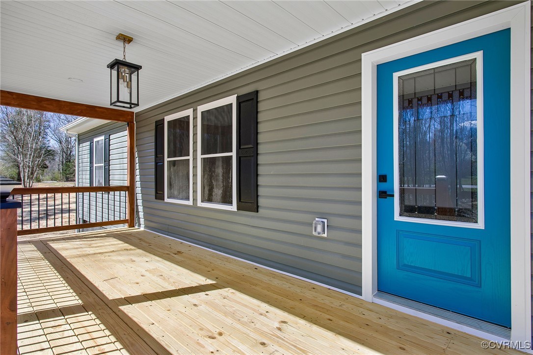 8011 Courthouse Road Providence Forge, VA 23140 - Photo 5 of 29 Wooden deck with covered porch