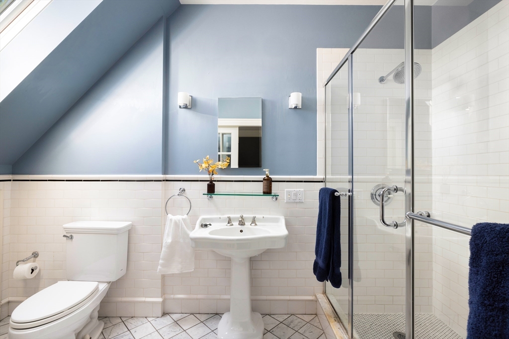 26 Knowles Street, Unit 26 Newton, MA 02459 - Photo 6 of 16 a bathroom with a sink toilet and shower