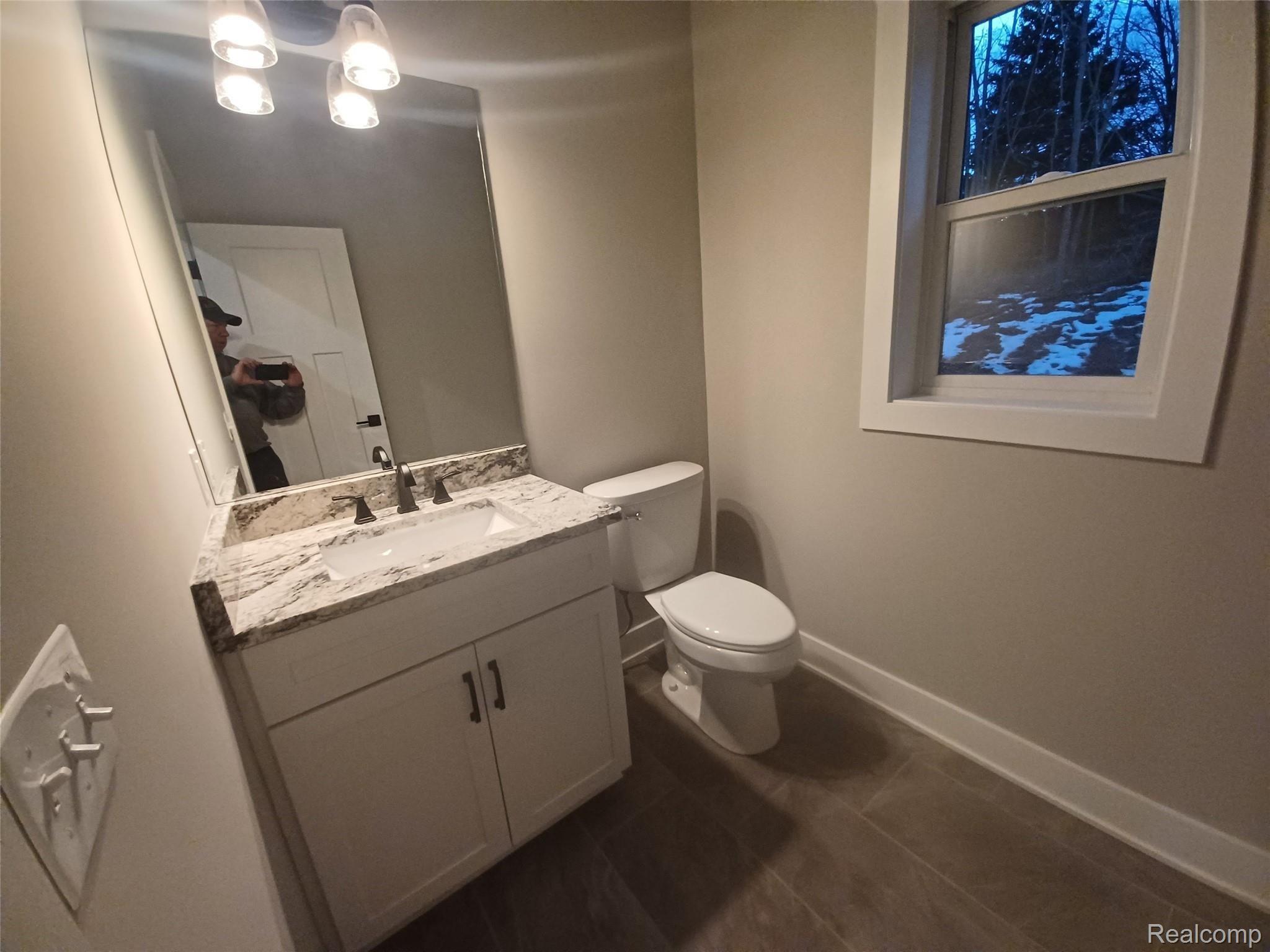 13270 Germany Road Fenton, MI 48430 - Photo 9 of 15 Half bath just off garage