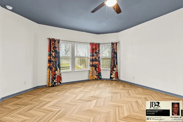 a view of a livingroom with furniture and chandelier