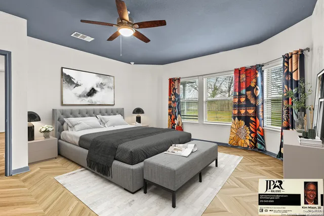 a bed room with a bed and a chandelier