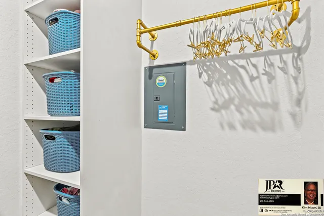 a bathroom with a tub shower and sink