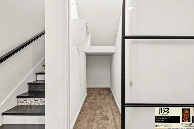 a view of a hallway with entryway