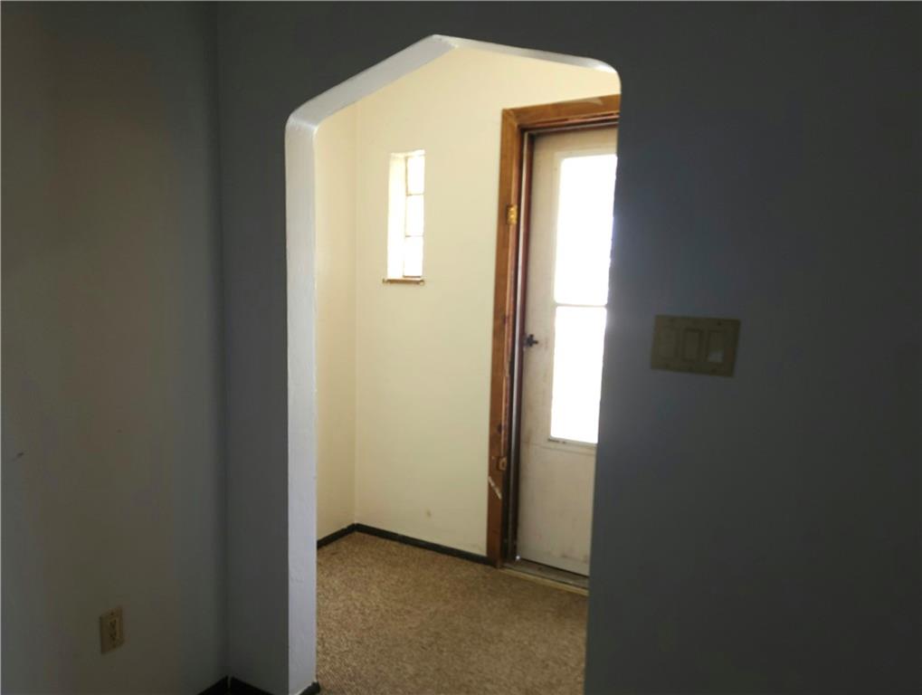605 McCoy Road McKees Rocks, PA 15136 - Photo 12 of 39 a view of a small space with wooden floor and a window