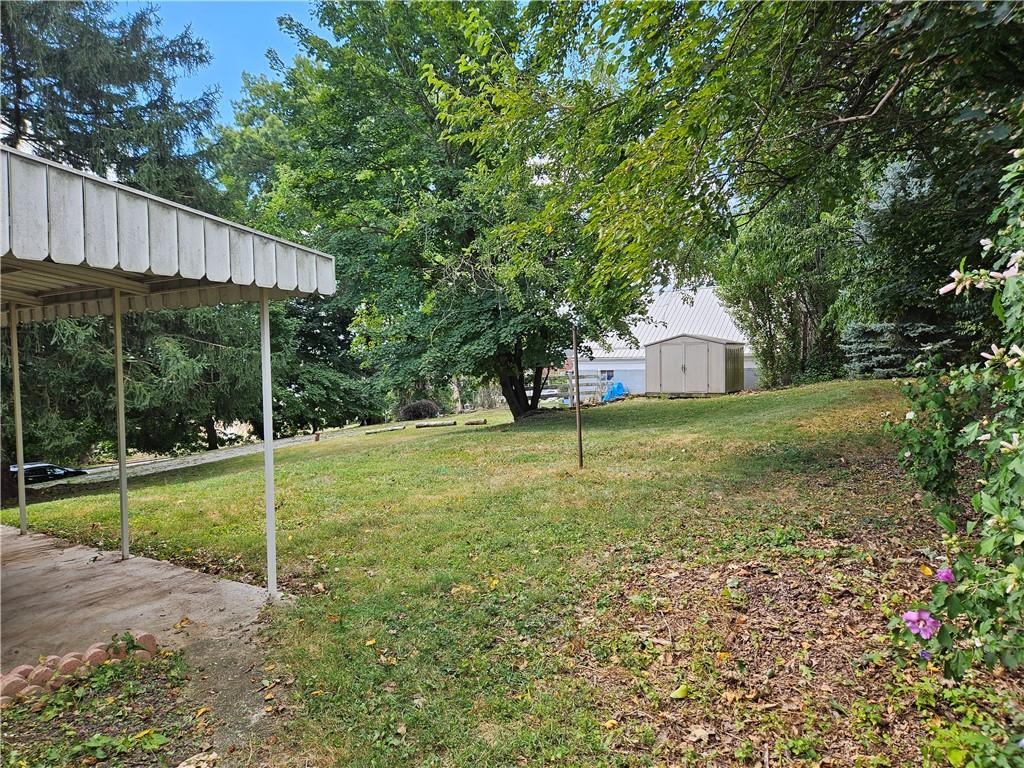 605 McCoy Road McKees Rocks, PA 15136 - Photo 23 of 39 a view of a house with backyard and sitting area