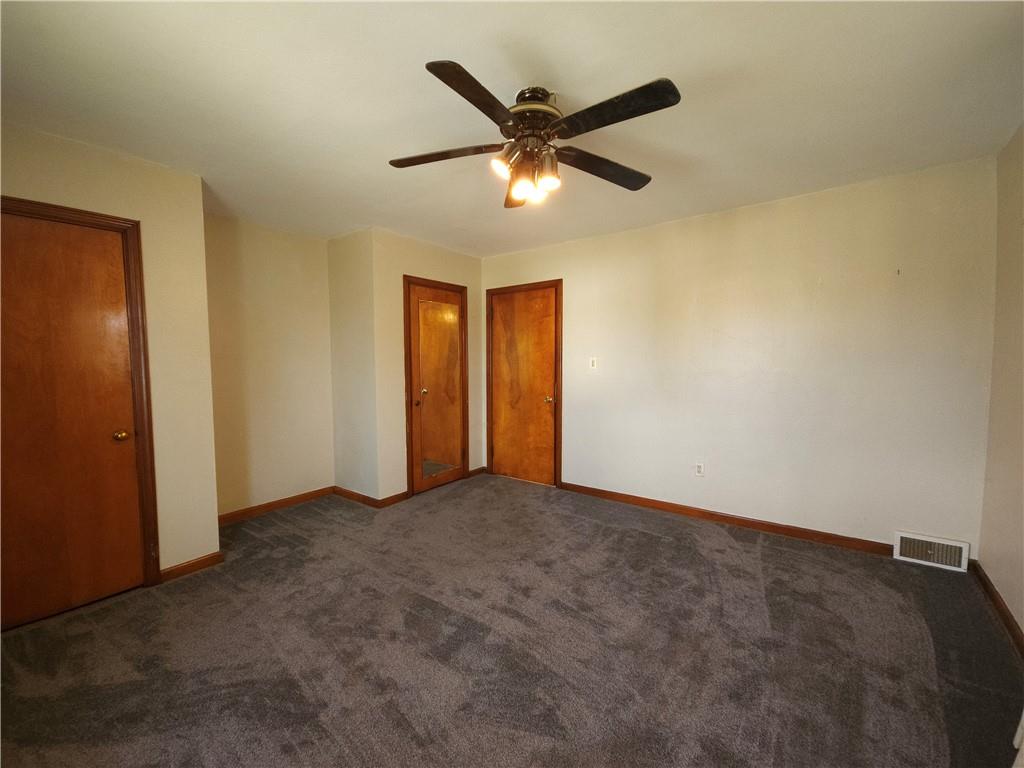 605 McCoy Road McKees Rocks, PA 15136 - Photo 25 of 39 an empty room with closet and windows