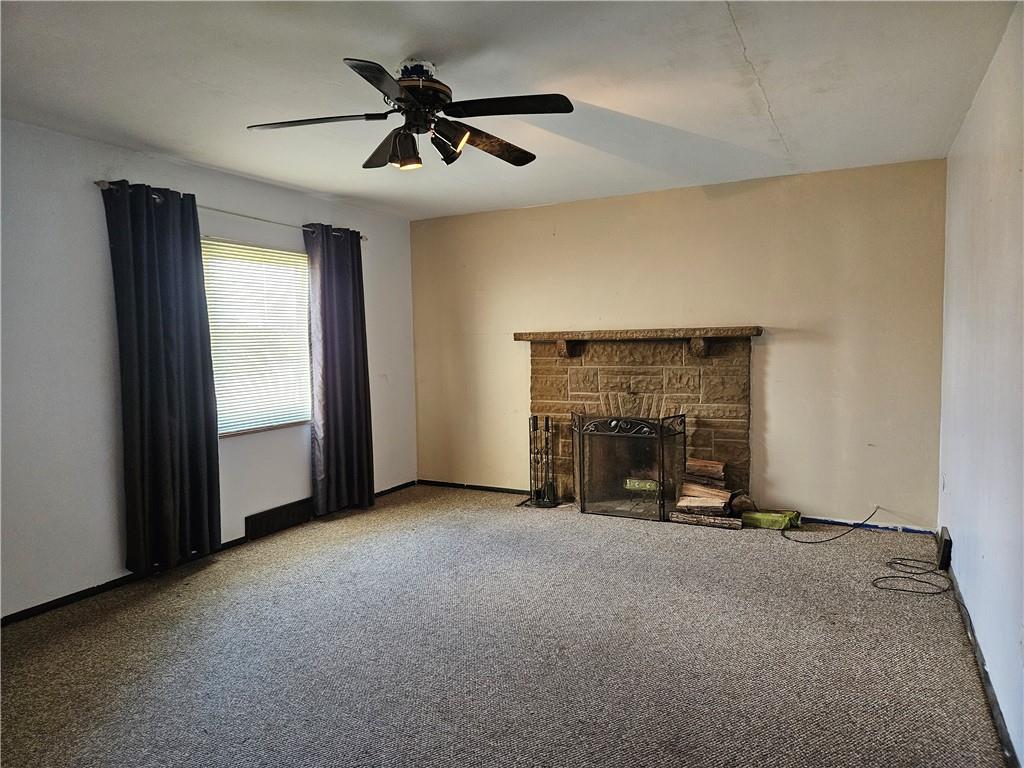 605 McCoy Road McKees Rocks, PA 15136 - Photo 30 of 39 an empty room with fireplace and windows
