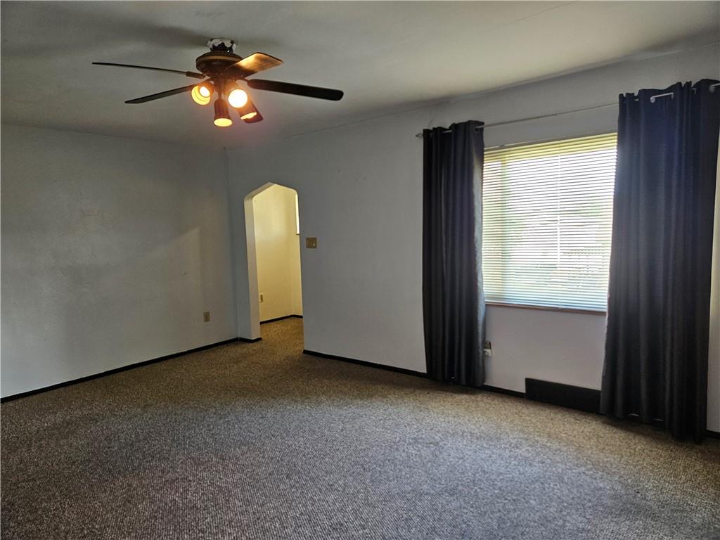 605 McCoy Road McKees Rocks, PA 15136 - Photo 31 of 39 wooden floor in an empty room with a window
