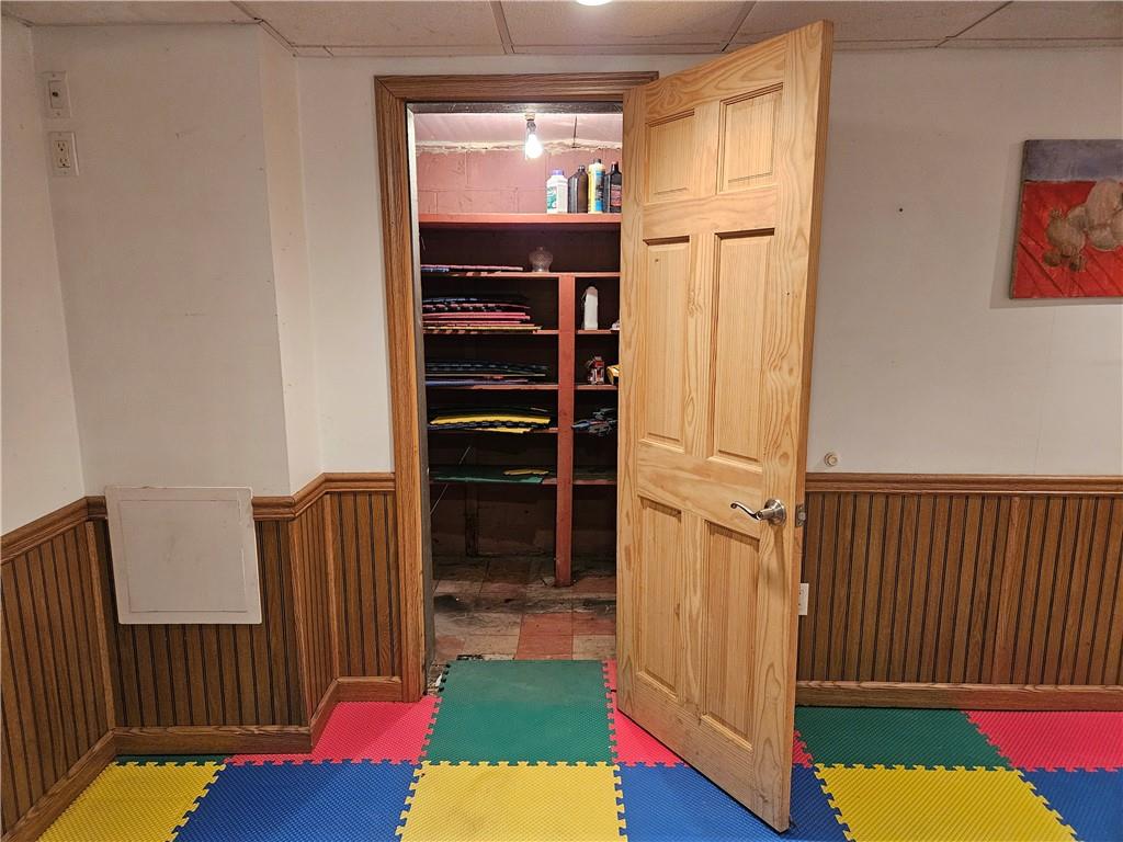 605 McCoy Road McKees Rocks, PA 15136 - Photo 35 of 39 a view of walk in closet with clothes and shoes