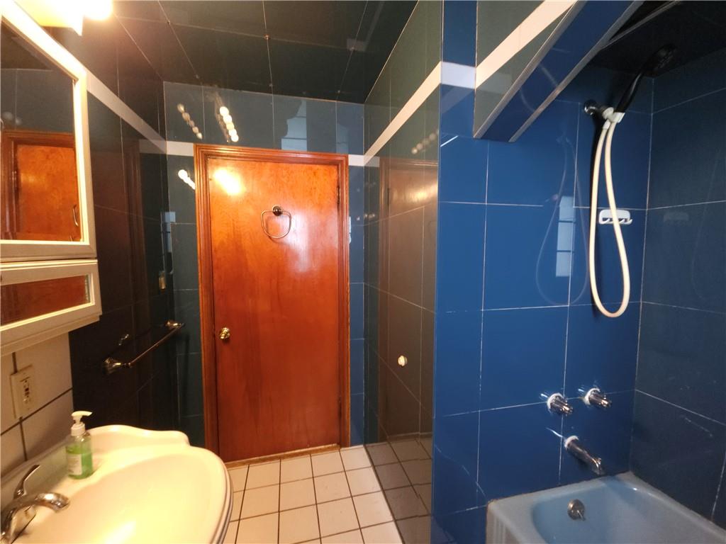 605 McCoy Road McKees Rocks, PA 15136 - Photo 8 of 39 a bathroom with a shower