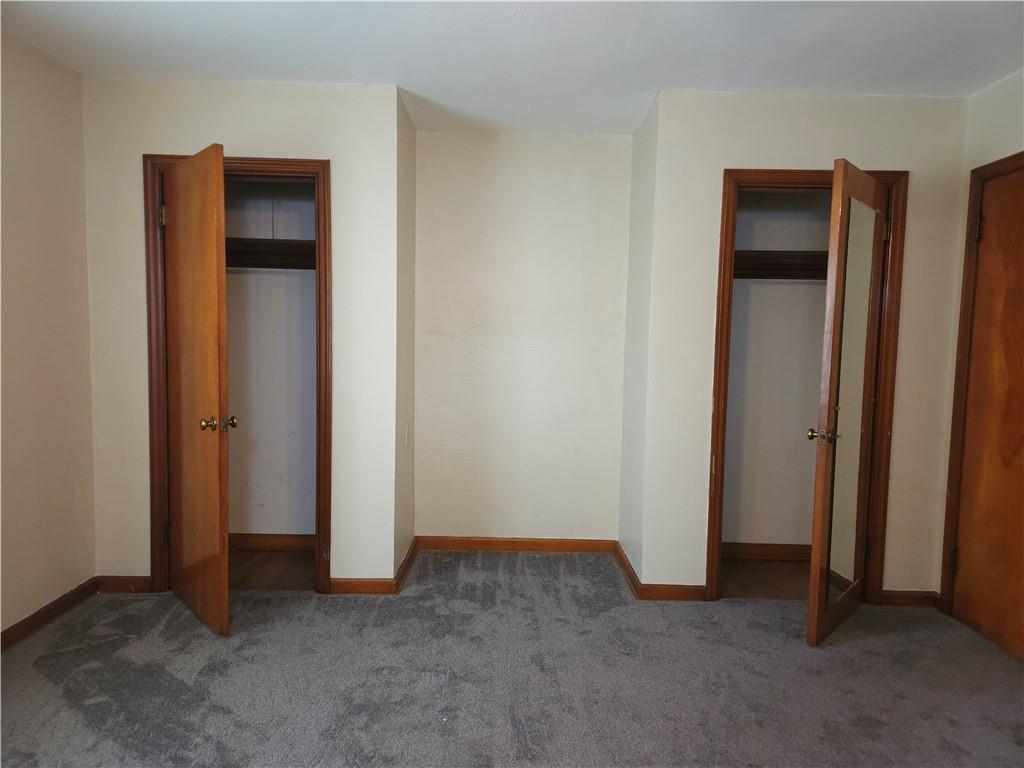 605 McCoy Road McKees Rocks, PA 15136 - Photo 9 of 39 a view of an empty room with closet and wooden floor